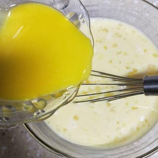 Milk Custard Steamed Buns step 10: Pour in the melted butter and mix thoroughly.