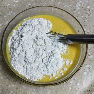 Milk Custard Steamed Buns step 13: Add the dry ingredients to the liquid mixture and whisk until no lumps remain.