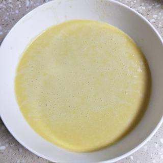 Milk Custard Steamed Buns step 14: Strain the mixture through a fine sieve for a smoother texture.