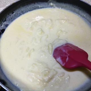 Milk Custard Steamed Buns step 16: Cook over low heat, stirring continuously.