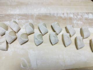 Milk Custard Steamed Buns step 21: Roll the dough into a log and divide into equal portions.