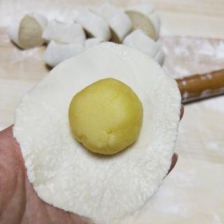 Milk Custard Steamed Buns step 23: Roll it into a round wrapper with a slightly thicker center.