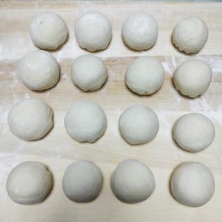 Milk Custard Steamed Buns step 25: Seal the dough around the filling as you would a steamed bun.
