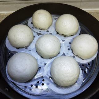 Milk Custard Steamed Buns step 28: Steam over high heat for 15 minutes, then let rest for 5 minutes before opening