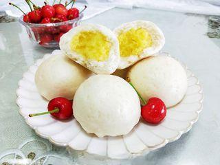 Milk Custard Steamed Buns step 29: Serve the steamed buns warm while the custard filling is soft and creamy.