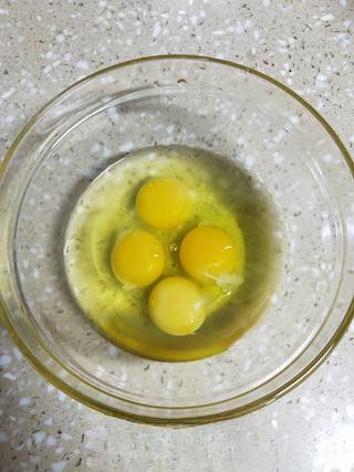 Milk Custard Steamed Buns step 6: Crack the eggs into a mixing bowl.