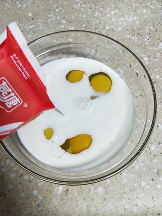 Milk Custard Steamed Buns step 7: Add the sugar and milk, then whisk until smooth.