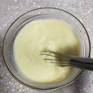 Milk Custard Steamed Buns step 9: Stir until all ingredients are evenly combined.