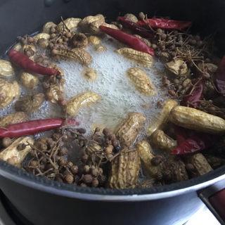 Boiled Fresh Peanuts step 5: Bring to a boil over medium heat, then reduce to low heat and simmer gently.