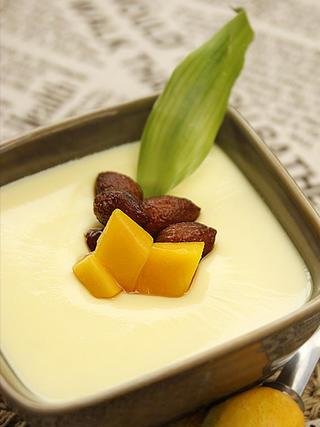 Steamed Milk Custard with Mango and Honey Almonds step 11: Remove the plastic wrap and top with mango cubes and honey almonds before servin