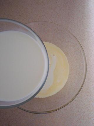 Steamed Milk Custard with Mango and Honey Almonds step 5: Pour in the milk and stir gently in one direction until smooth. Let the mixture 