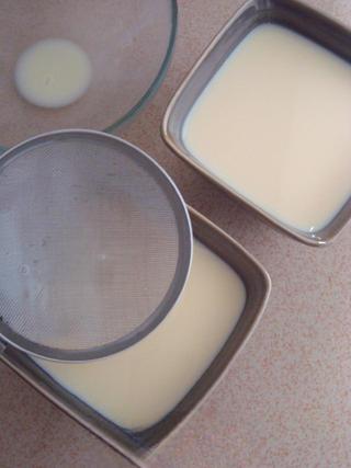 Steamed Milk Custard with Mango and Honey Almonds step 6: Strain the milk-egg mixture again and pour it into a heatproof bowl.