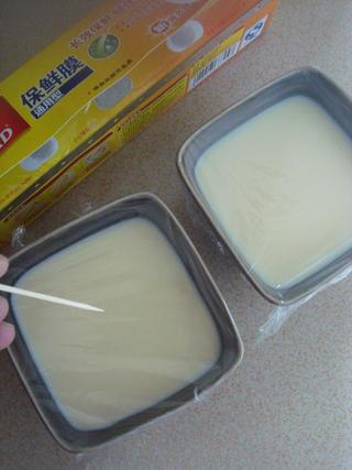 Steamed Milk Custard with Mango and Honey Almonds step 7: Cover the bowl with plastic wrap and poke several small holes using a toothpick.