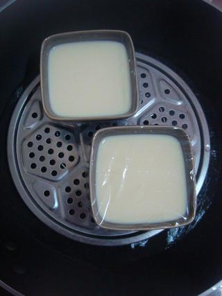 Steamed Milk Custard with Mango and Honey Almonds step 9: Place the bowl into a steamer over boiling water.
