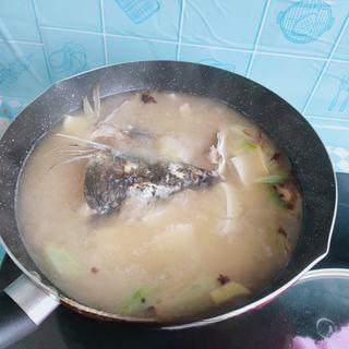 Catfish and Tofu Vegetable Soup step 11: Bring to a boil, then reduce heat and simmer for about 15 minutes.