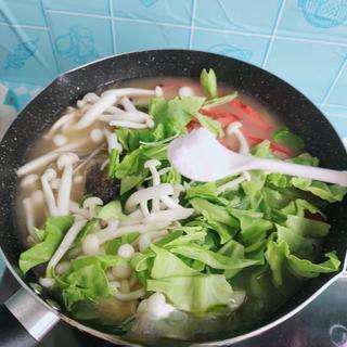 Catfish and Tofu Vegetable Soup step 12: Add the prepared vegetables and season with salt to taste.