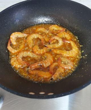 Sweet and Sour Braised Shrimp step 13: Return the shrimp to the pan and toss until evenly coated with the sauce. Simmer