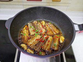 Braised Croaker in Savory Sweet Sauce step 11: Cover and simmer over medium-low heat for 2–3 minutes until the fish absorbs the