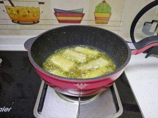 Braised Croaker in Savory Sweet Sauce step 6: Heat enough oil in a pan and fry the fish pieces until golden on one side.
