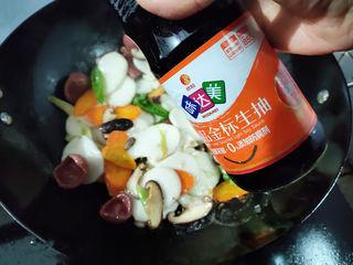 Stir-Fried Rice Cakes with Crispy Sausage and Vegetables step 9: Add a little light soy sauce and stir-fry to combine. If needed, add a splash of