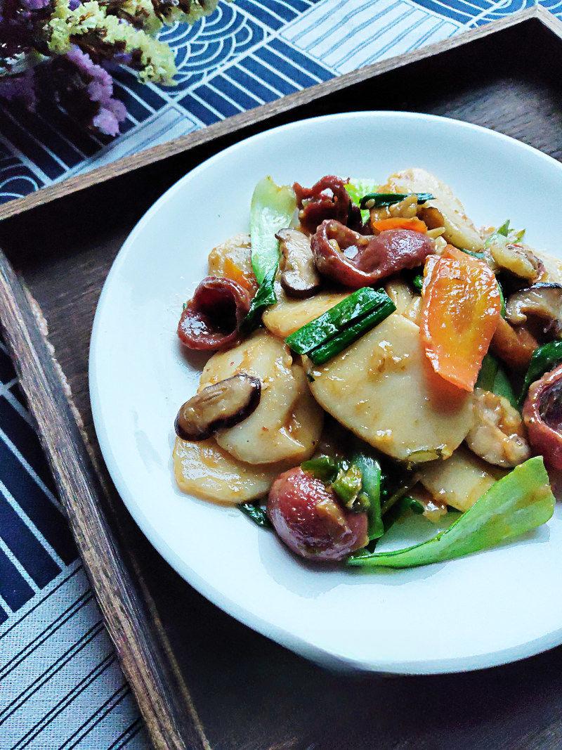 Stir-Fried Rice Cakes with Crispy Sausage and Vegetables recipe photo
