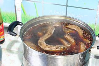 Spicy Braised Duck Necks step 14: Bring the braising liquid to a gentle simmer and cook the duck necks for about 2