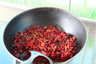 Spicy Braised Duck Necks step 5: To prepare the spicy braising broth, heat oil and stir-fry the dried chilies unt