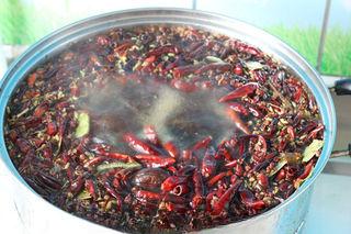 Spicy Braised Duck Necks step 8: Season with dark soy sauce, light soy sauce, salt, and sugar. Bring to a boil.