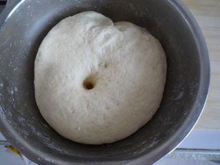Steamed Milk Bread Rolls step 3: Check the dough by pressing a finger into it. If the indentation remains, the do