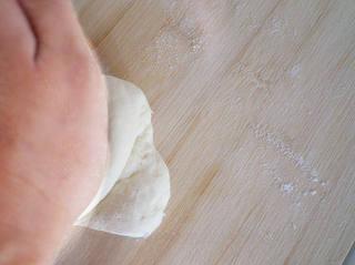 Steamed Milk Bread Rolls step 5: Roll and knead each portion repeatedly until smooth.